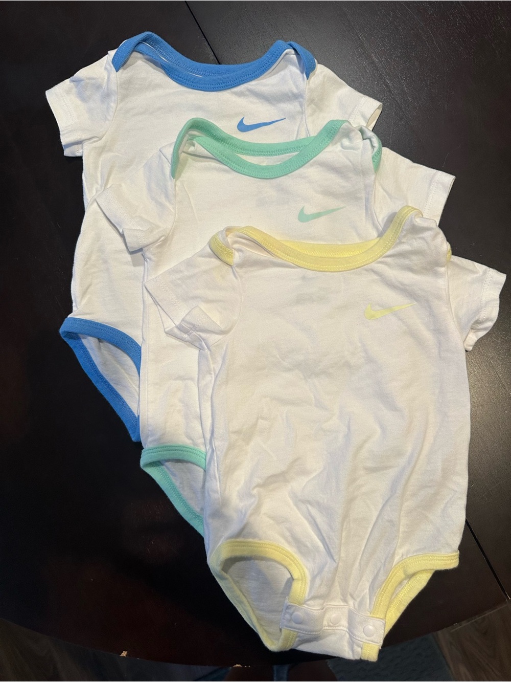Baby 6M Nike White Baby Bodysuits with Blue, Mint, and Yellow Trim - 3 Pack